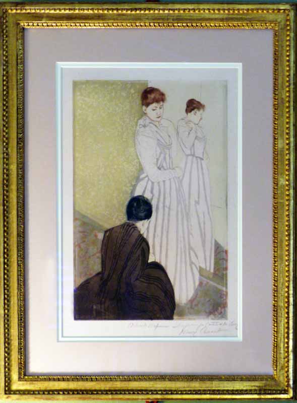 Green Guest Room : L'essayage, par Mary
                      Cassatt (1890-91)